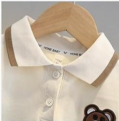 Ju Ju Jam boys' set with a brown collared shirt and striped design, paired with matching pants for a sophisticated appearance.