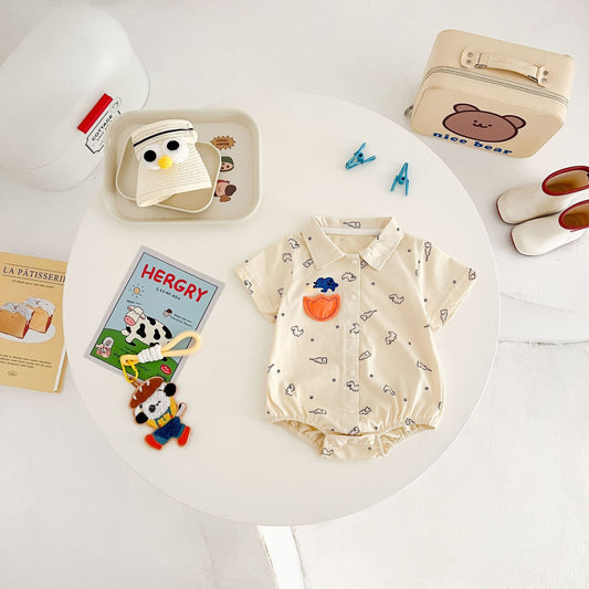 Comfy Dino baby boys romper shirt – soft and playful dinosaur-themed outfit by Ju Ju Jam.

