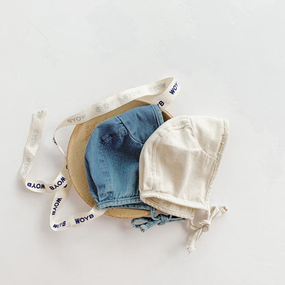 Ju Ju Jam denim babywear – soft and breathable romper with coordinating cap for babies.

