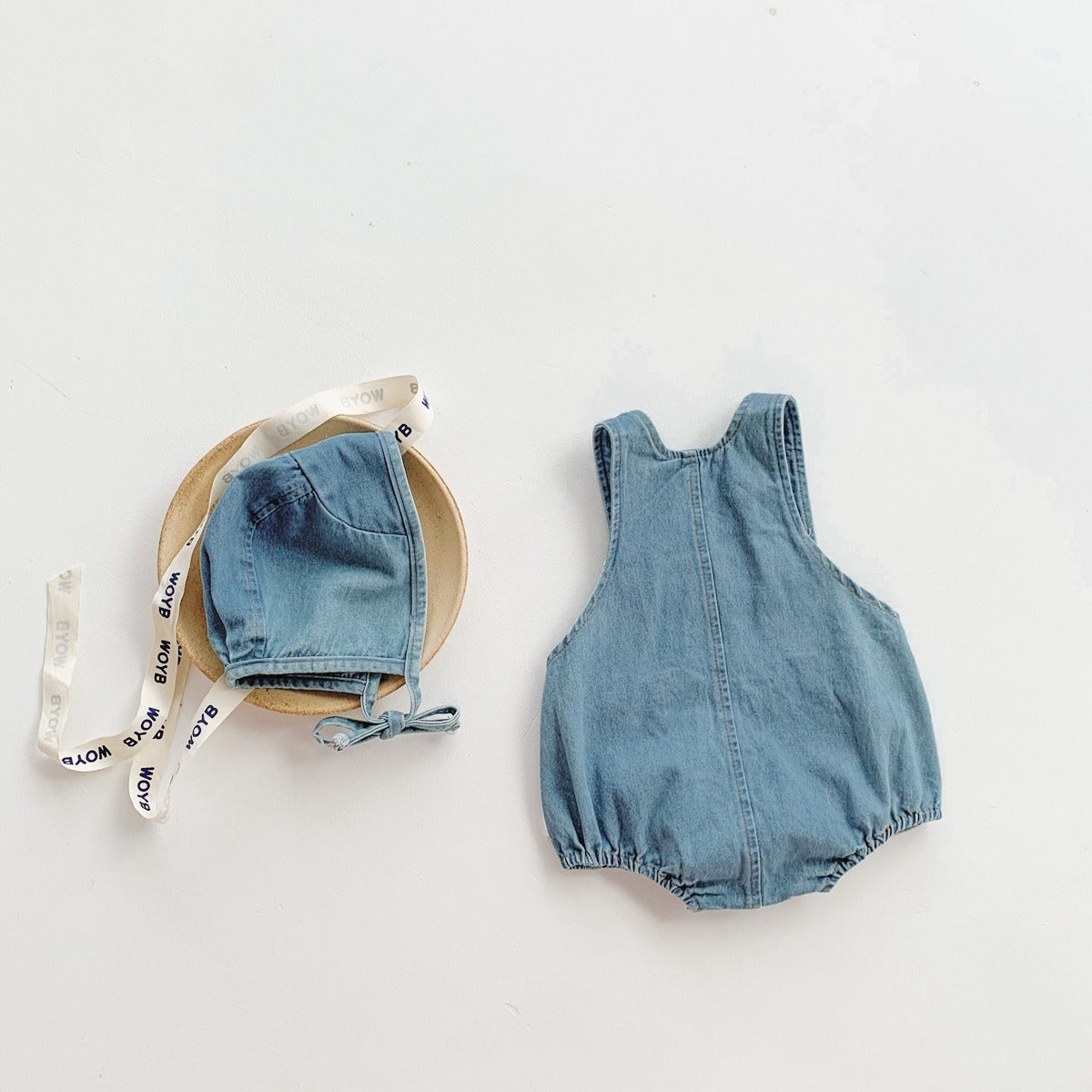 Casual denim romper and cap set – comfy baby outfit for boys and girls by Ju Ju Jam.

