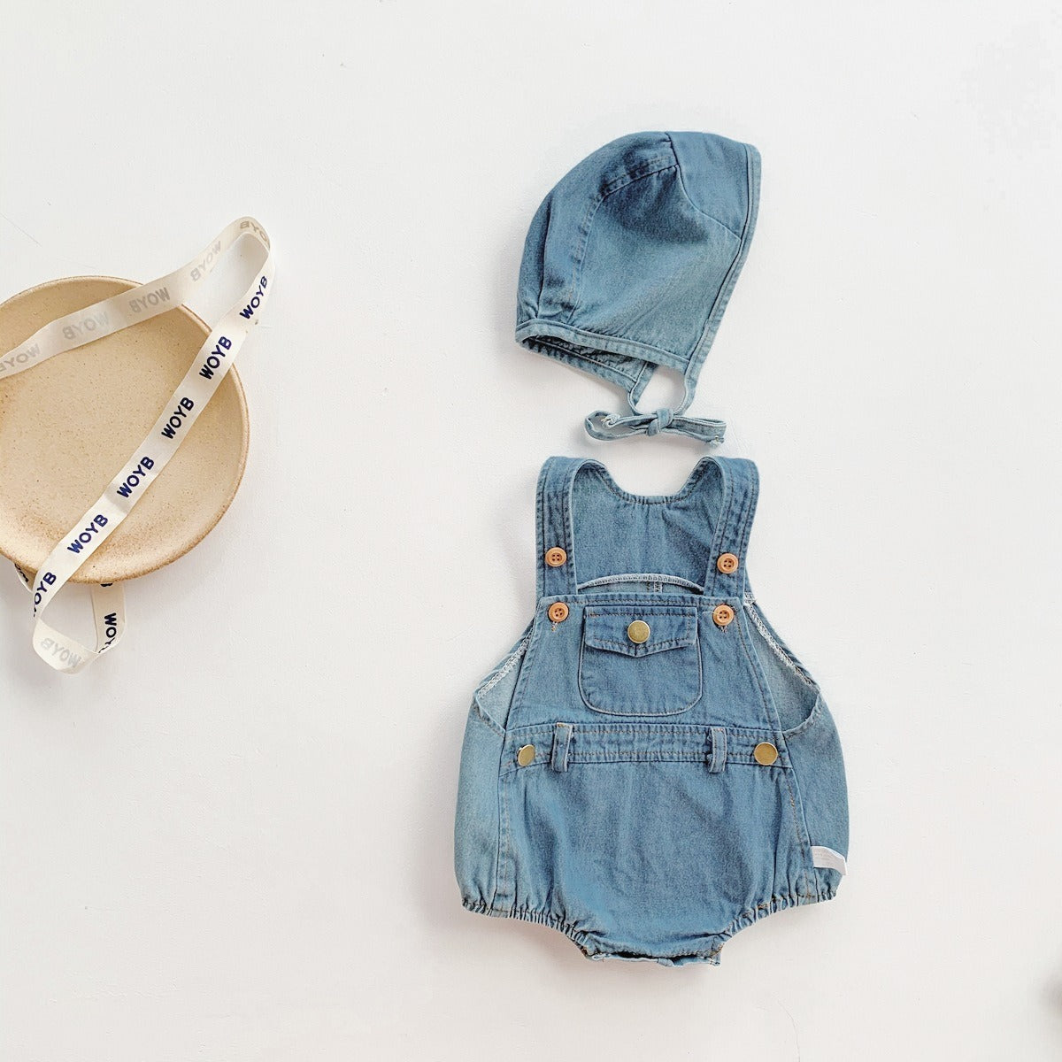 Ju Ju Jam baby romper – classic denim one-piece with matching cap for boys and girls.

