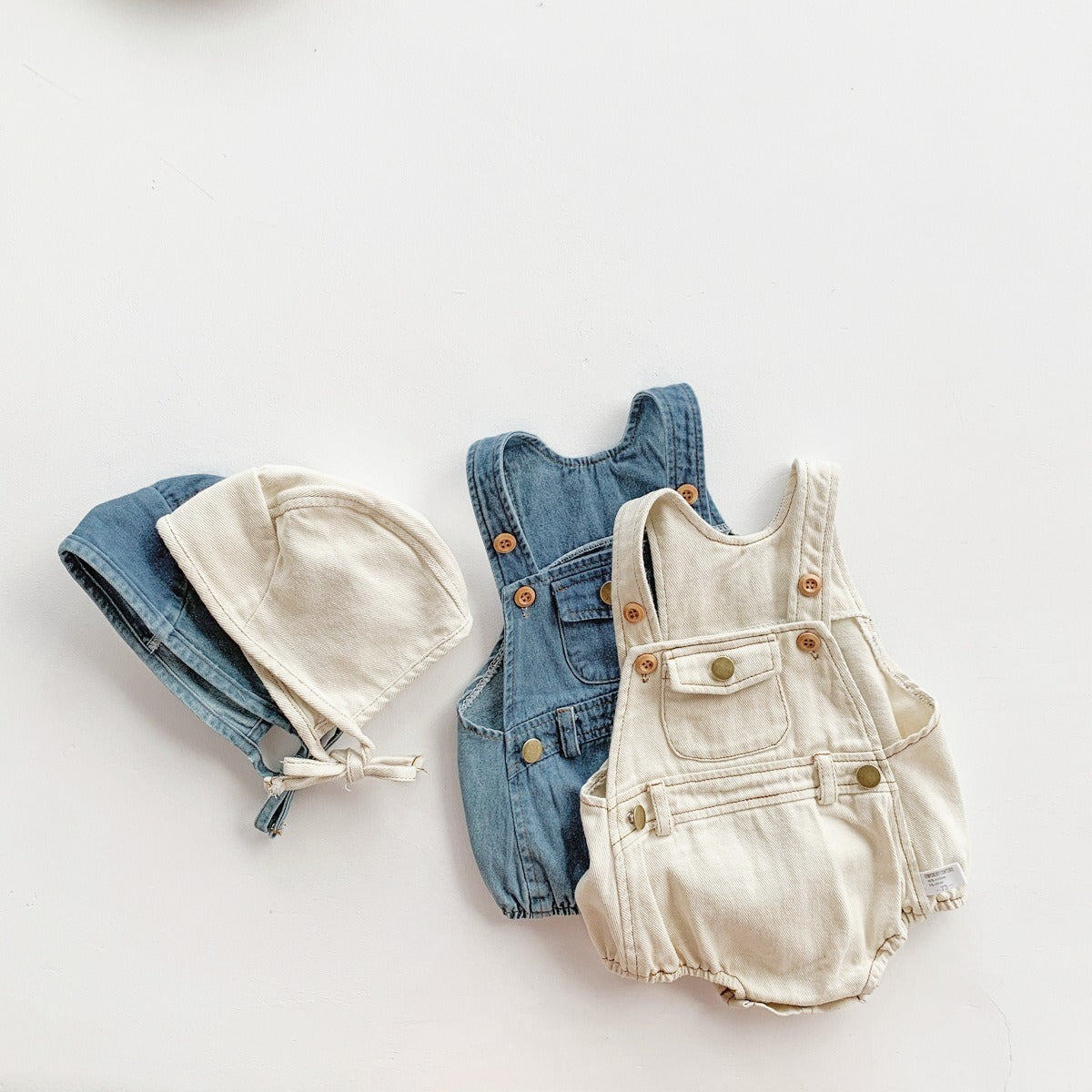 Ju Ju Jam denim romper for infants – cute baby outfit with matching cap, perfect for casual outings.

