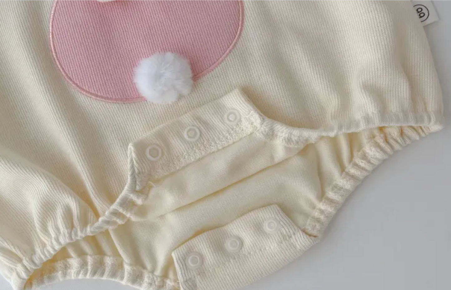 Ju Ju Jam baby girl romper styled with bunny ears hoodie and tail back

