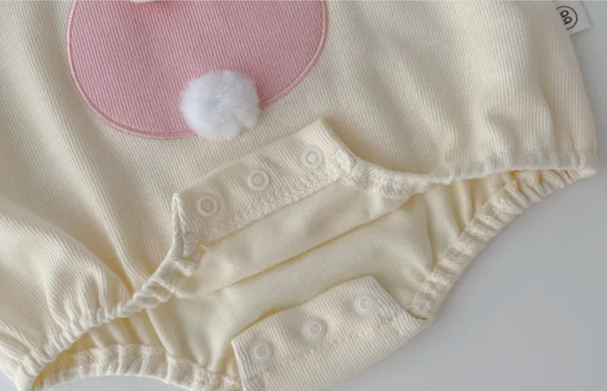 Ju Ju Jam baby girl romper styled with bunny ears hoodie and tail back

