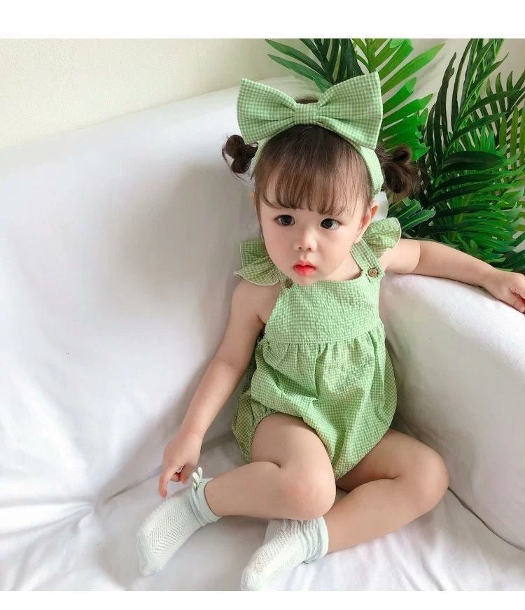 Green Checkered romper with bow for baby girls, designed for style and comfort from Ju Ju Jam.