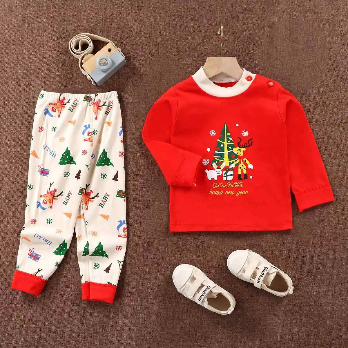 Kids wearing the cozy Little Boys and Girls New Year and Christmas Lounge Set, ideal for New Year and Christmas festivities.