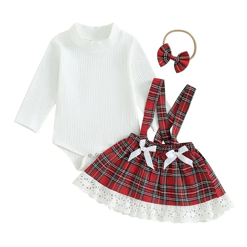 Elegant Plaid Charm romper set for baby girls, complete with a bow, designed by Ju Ju Jam.