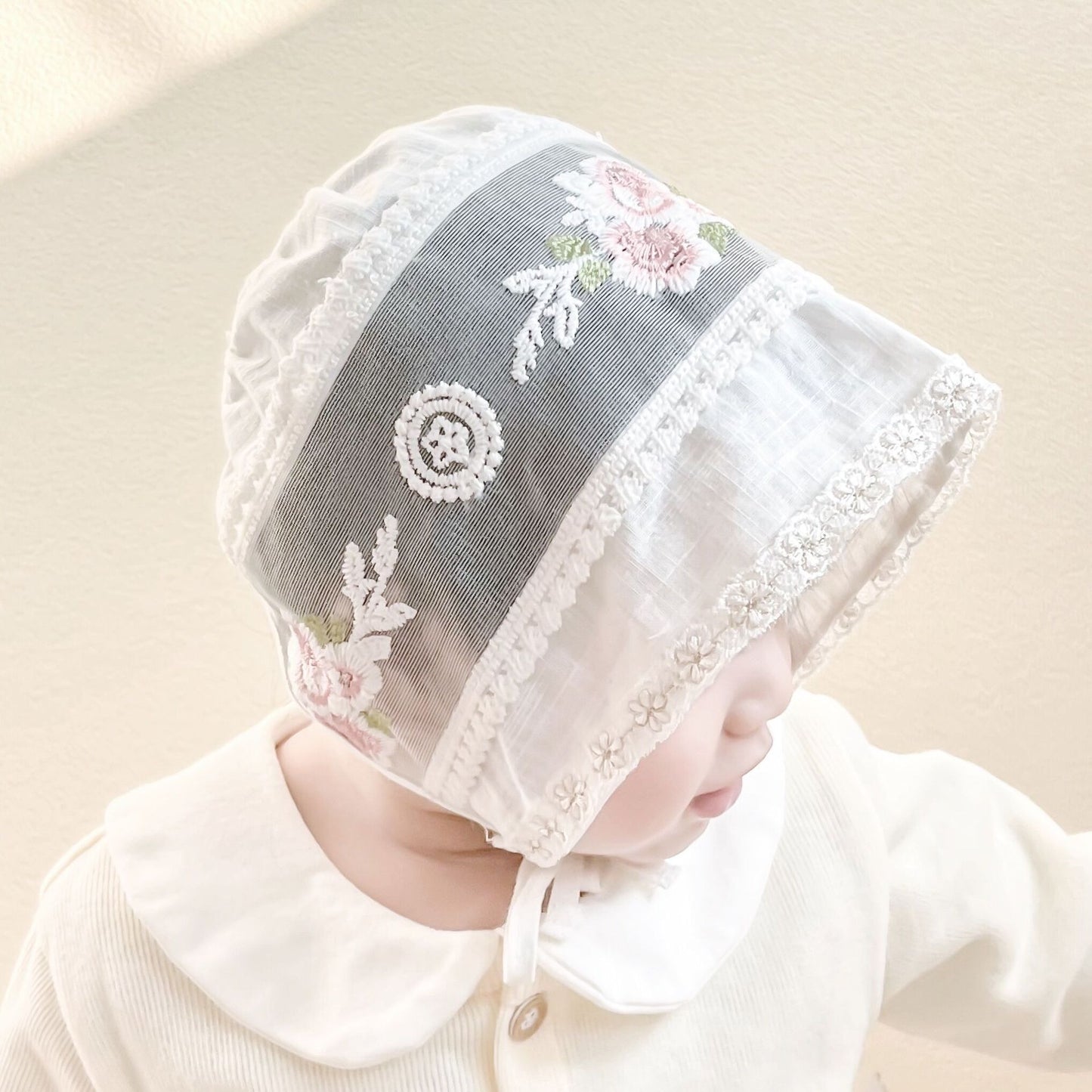 Ju Ju Jam baby girl cap – ivory cotton cap with beautiful stitched floral patterns.

