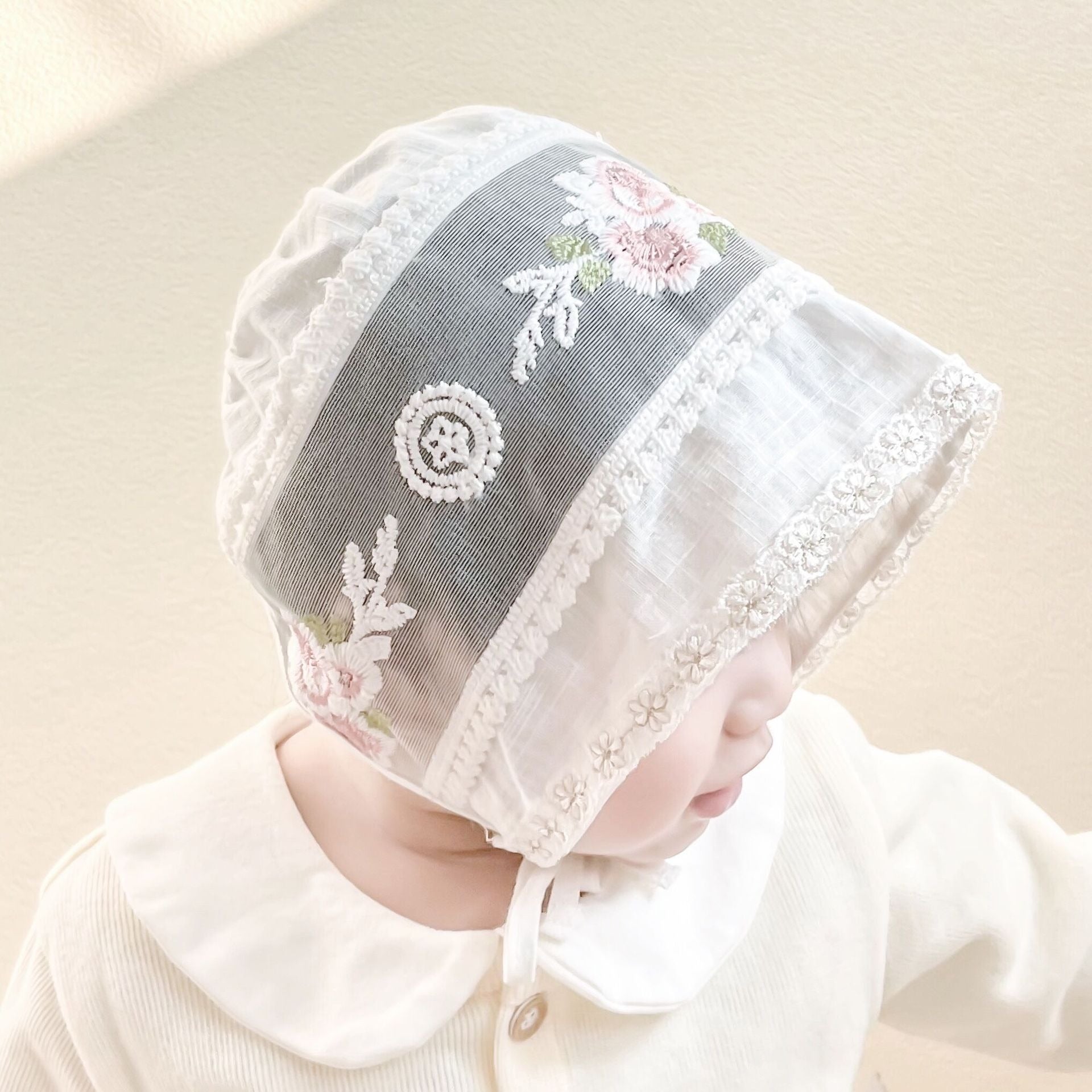 Ju Ju Jam baby girl cap – ivory cotton cap with beautiful stitched floral patterns.

