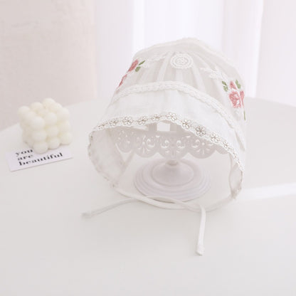 Ivory baby cap with detailed embroidery – gentle and elegant hat for girls by Ju Ju Jam.

