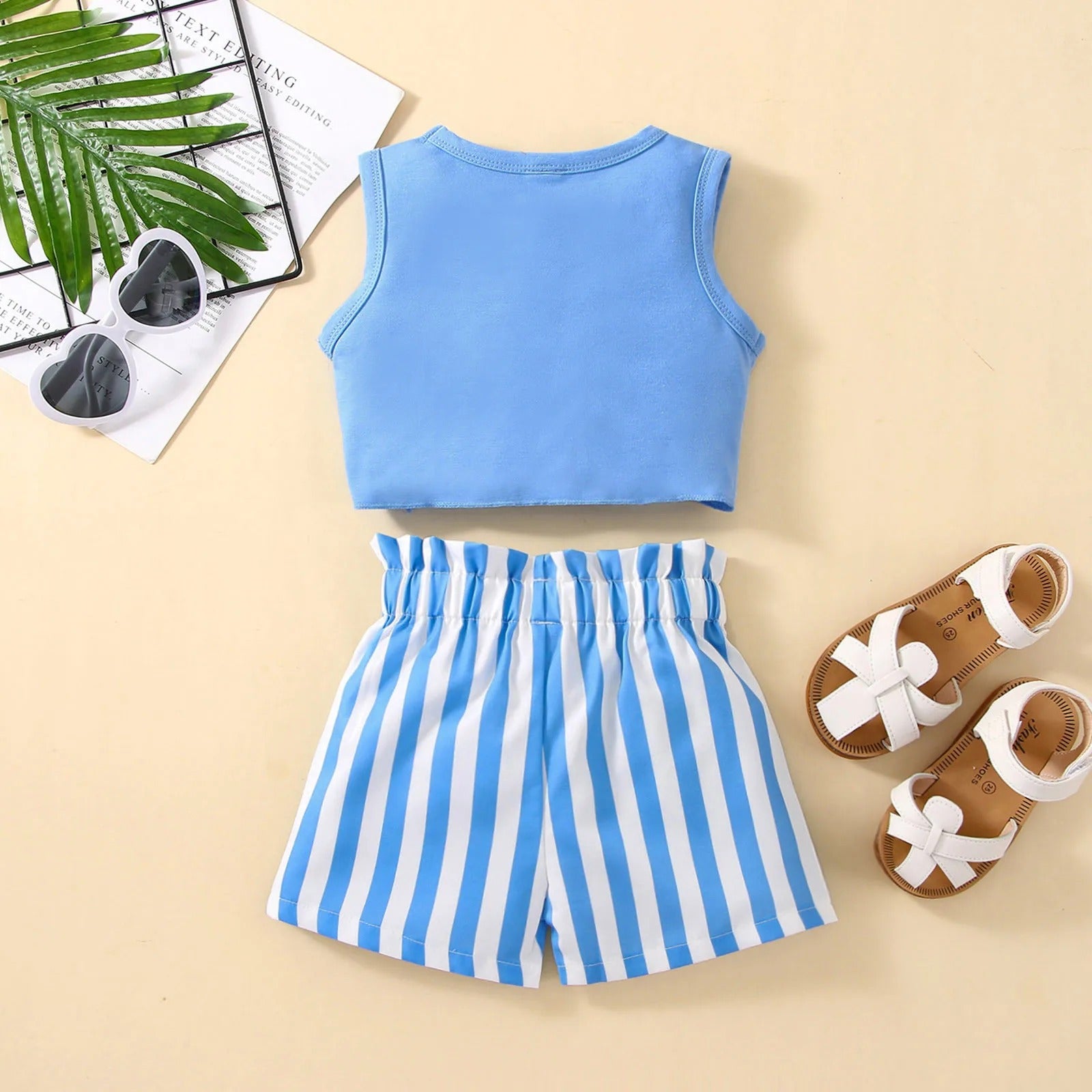 Knotty Stripes Girls Duo Set by Ju Ju Jam – Stylish set with a striped top featuring a knot detail and coordinating pants, perfect for a chic look.