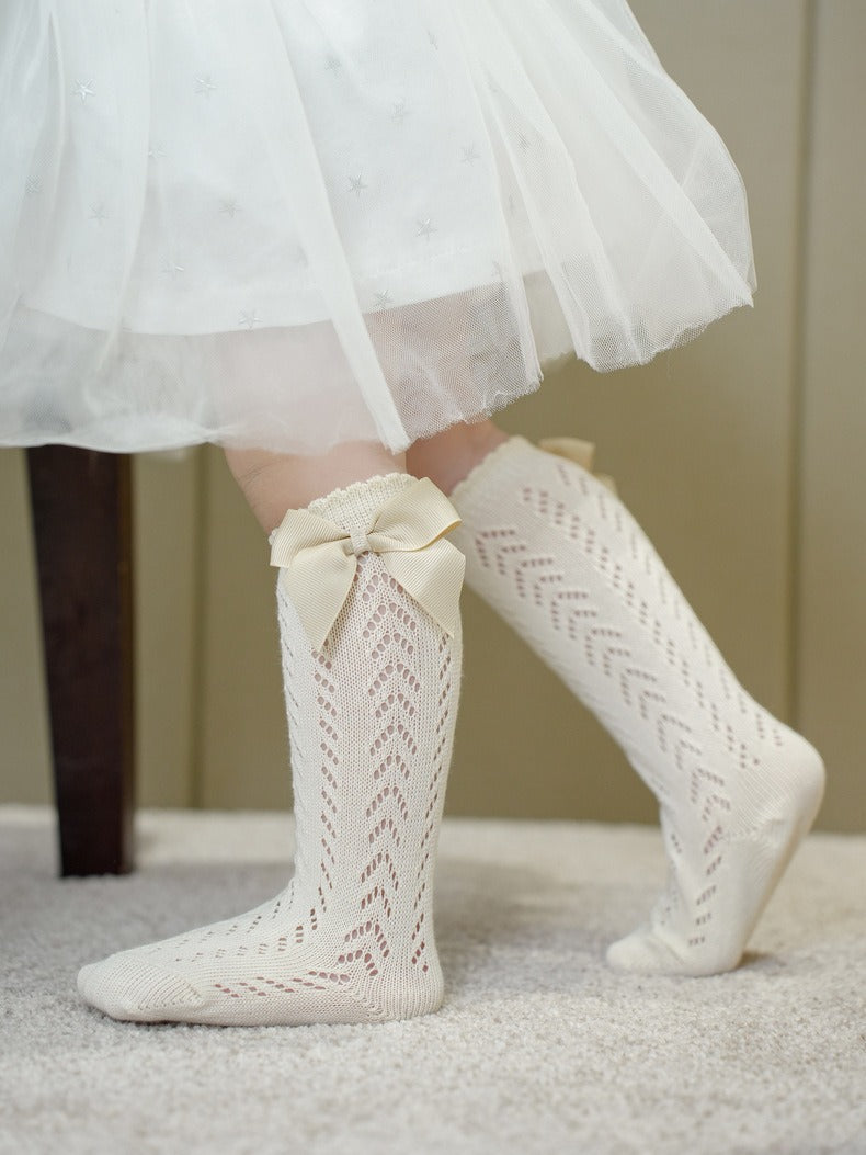 Comfortable lace socks with bow for infants – Ju Ju Jam fashionable baby girls’ accessories.

