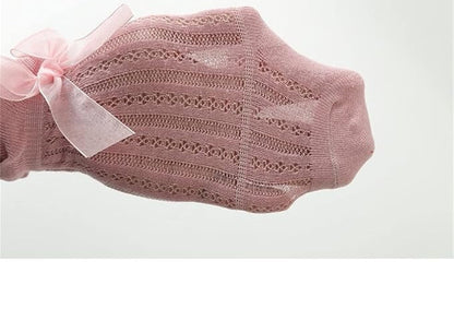 Elegant baby girl socks – Ju Ju Jam lace-trimmed socks with decorative bow.


