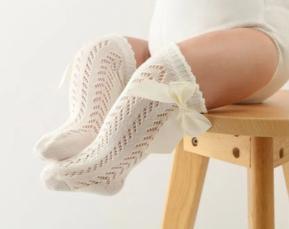 Baby girl breathable socks – Ju Ju Jam socks with lace edges and dainty bow accents.

