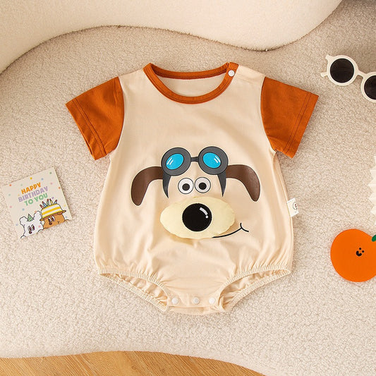Baby in Little Whimsy Doodle Romper by Ju Ju Jam – playful and artistic baby outfit

