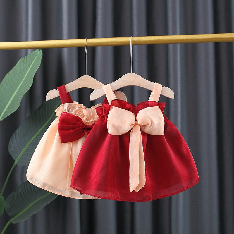 Back view of Melody Bow Girls Dress with large bow accent – designer baby dress from Ju Ju Jam

