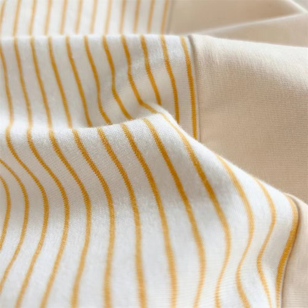 Adorable sunshine print romper for baby boys – Mini Sunshine design by Ju Ju Jam.

