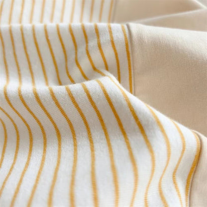 Adorable sunshine print romper for baby boys – Mini Sunshine design by Ju Ju Jam.

