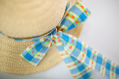 Baby girl wearing Mira Blue Checkered Dress and hat – Ju Ju Jam picnic outfit

