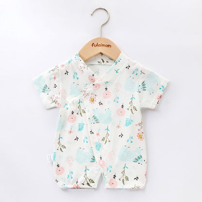 Baby boy and girl in a Nature romper from Ju Ju Jam.