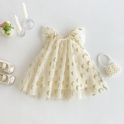 Back view of Nyla Party Princess Sequin Dress by Ju Ju Jam – bow tie detail and zipper closure

