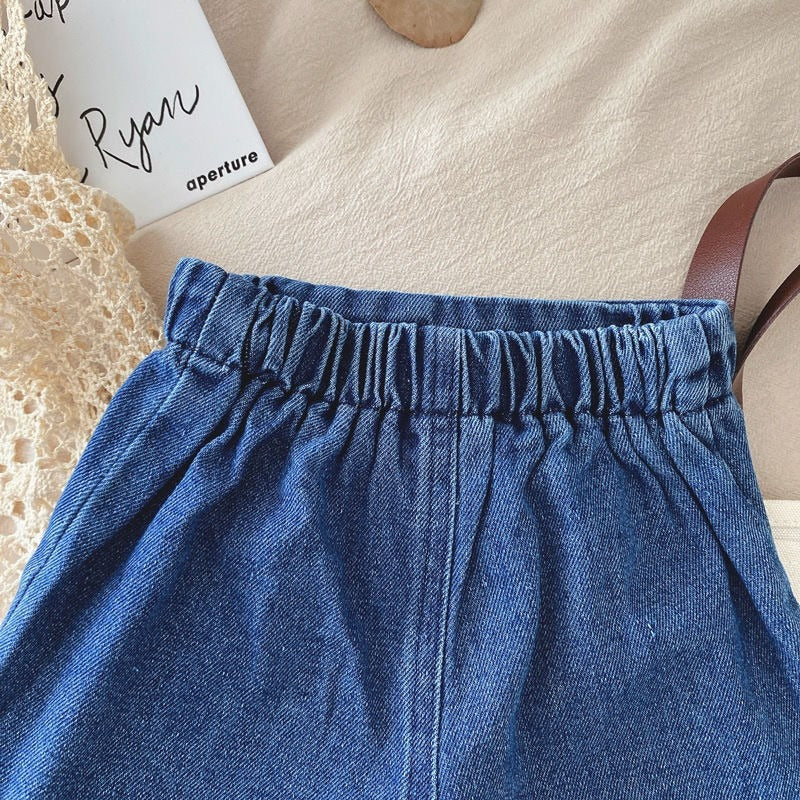 Baby girl ivory outfit – matching skorts and top set designed for play and elegance, by Ju Ju Jam.

