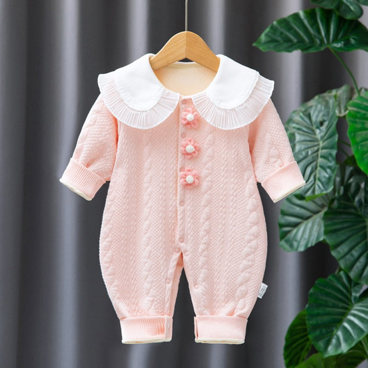 Adorable baby girls' romper, made with soft fabrics for a cozy feel, perfect for everyday wear, from Ju Ju Jam.