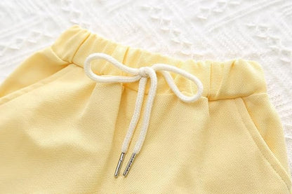 Ju Ju Jam pastel baby girl co-ord set with three-dimensional flower embellishments, including a pastel top and matching pants for a cute and coordinated look.