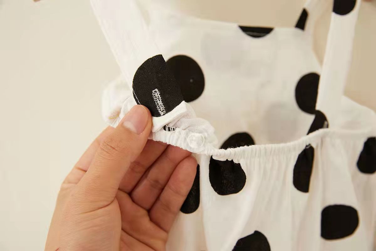 Back view of Polka Pop baby jumpsuit and matching cap – Ju Ju Jam

