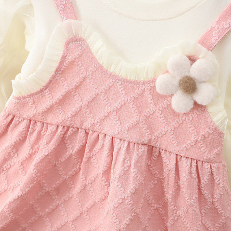 Baby girls' Pretty Pink Textured Dress - Elegant and eye-catching pink dress with a textured finish, ideal for special occasions, available at Ju Ju Jam.