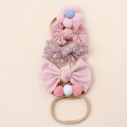 Ju Ju Jam Pretty in Pink 5 Piece Baby Girls Hair Accessories Set – adorable pink bows and clips for infants.

