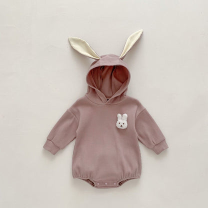 Fluffy rabbit-inspired baby onesie – soft cotton hooded romper with tail for boys and girls by Ju Ju Jam.

