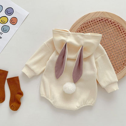 Hooded baby onesie with bunny tail – cute and cozy rabbit-style romper for boys and girls by Ju Ju Jam.

