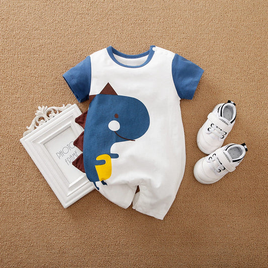 Baby wearing Rawr Cutie Romper by Ju Ju Jam with playful dinosaur print