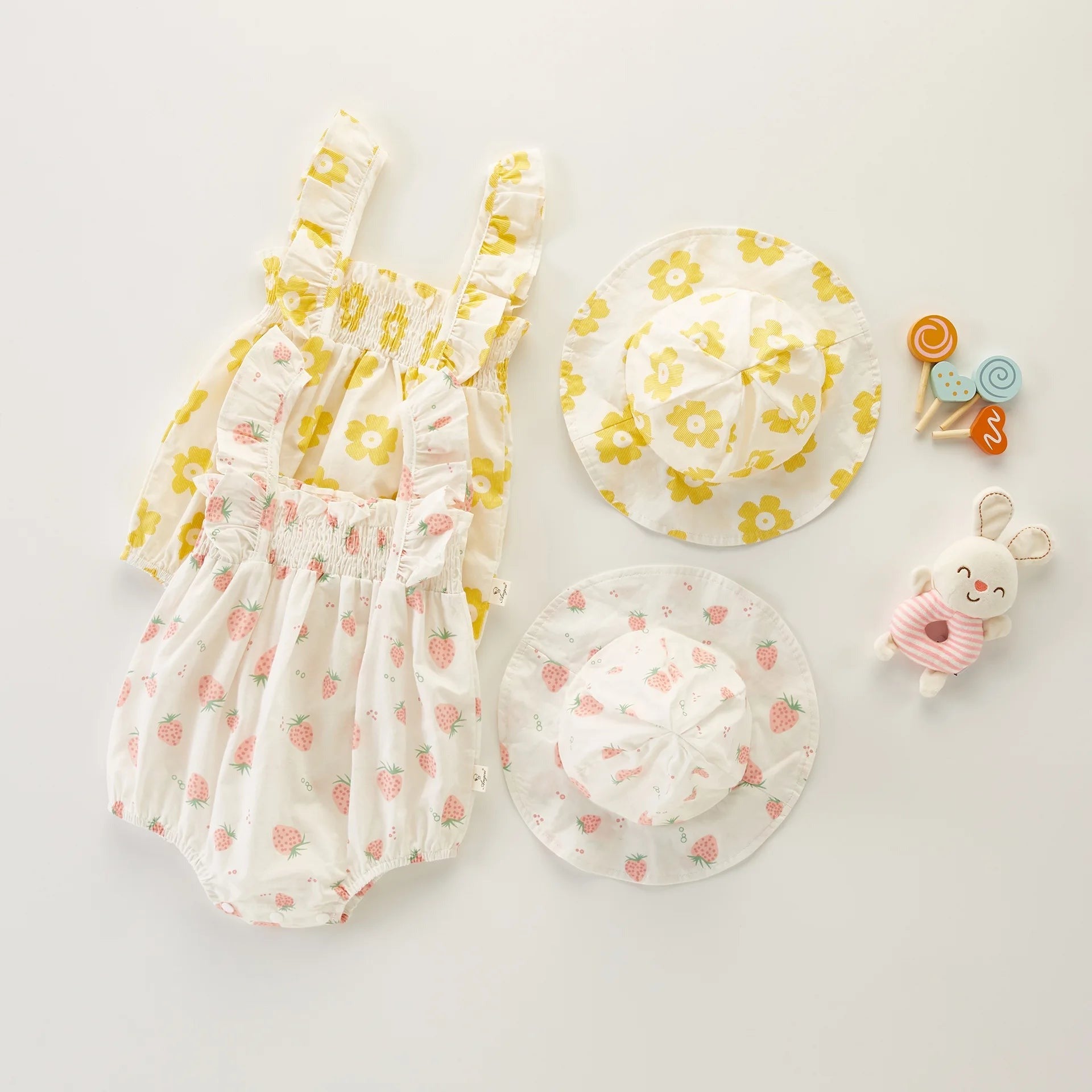 Shiny and ruffled romper with matching hat for baby girls – Ju Ju Jam fashion set