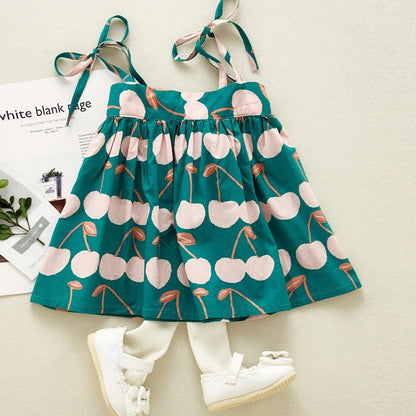 Baby girls' printed dress with shoulder knot details, ideal for casual and special occasions - Available at Ju Ju Jam.