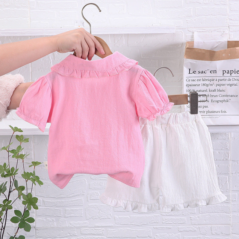 Ju Ju Jam girls' outfit featuring a stylish button-up shirt and fashionable shorts