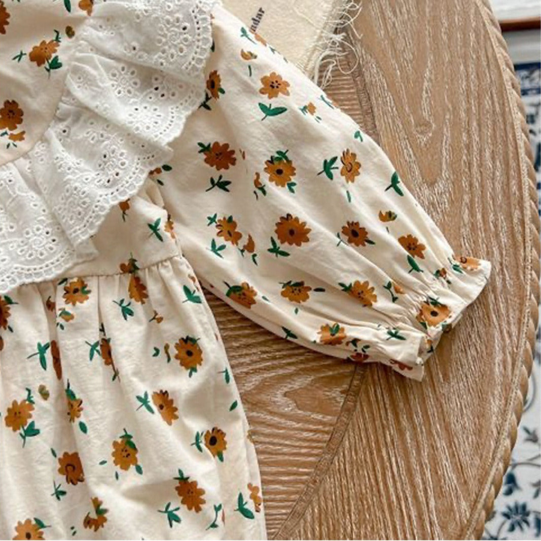 Ju Ju Jam Stella baby romper for girls – frilled one-piece with coordinating cap for newborns and toddlers.