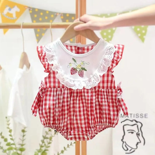 Strawberry Plaid baby girls romper by Ju Ju Jam – adorable plaid romper with cute strawberry accents.

