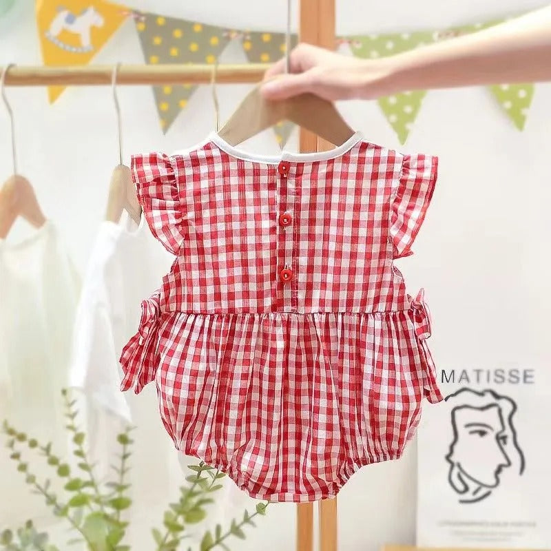 Charming strawberry plaid romper for baby girls – stylish and comfy outfit by Ju Ju Jam.

