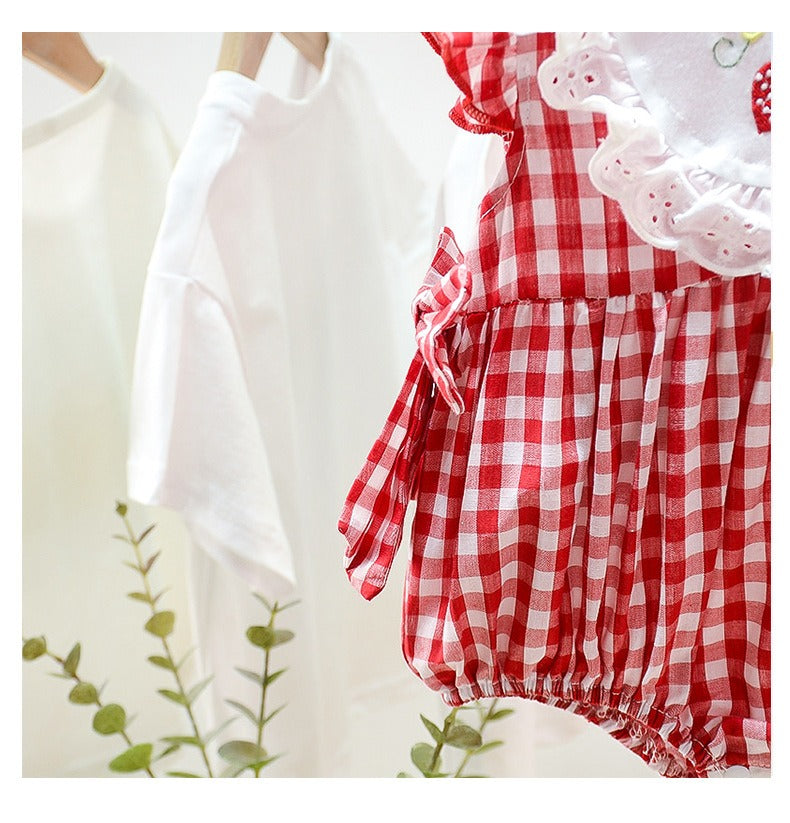 Plaid baby girl romper with strawberry prints – cute one-piece from Ju Ju Jam kidswear collection.

