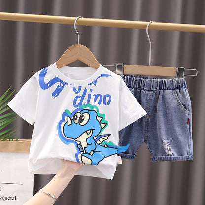 Boys' Tail Hanging Dino outfit from Ju Ju Jam, including a dinosaur-themed shirt with a hanging tail and coordinating pants.