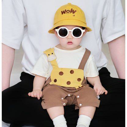 Baby in Tiny Sunny Safari Jumpsuit by Ju Ju Jam – cheerful safari-themed baby outfit

