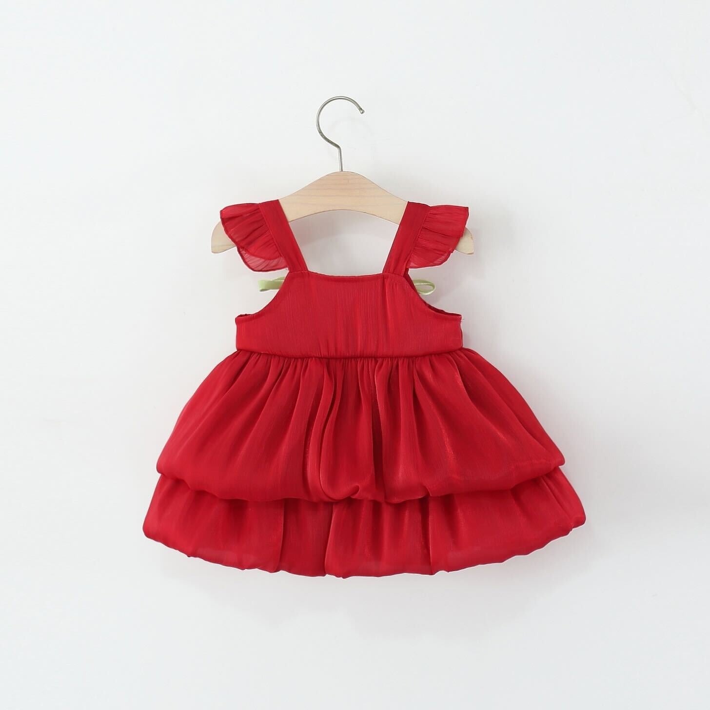 Ju Ju Jam baby girl dress with tulip-shaped hanging details and layered skirt


