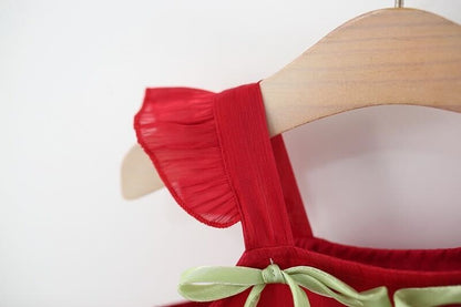 Back view of Tulip Hanging Girls Dress – flowy and fashionable outfit from Ju Ju Jam

