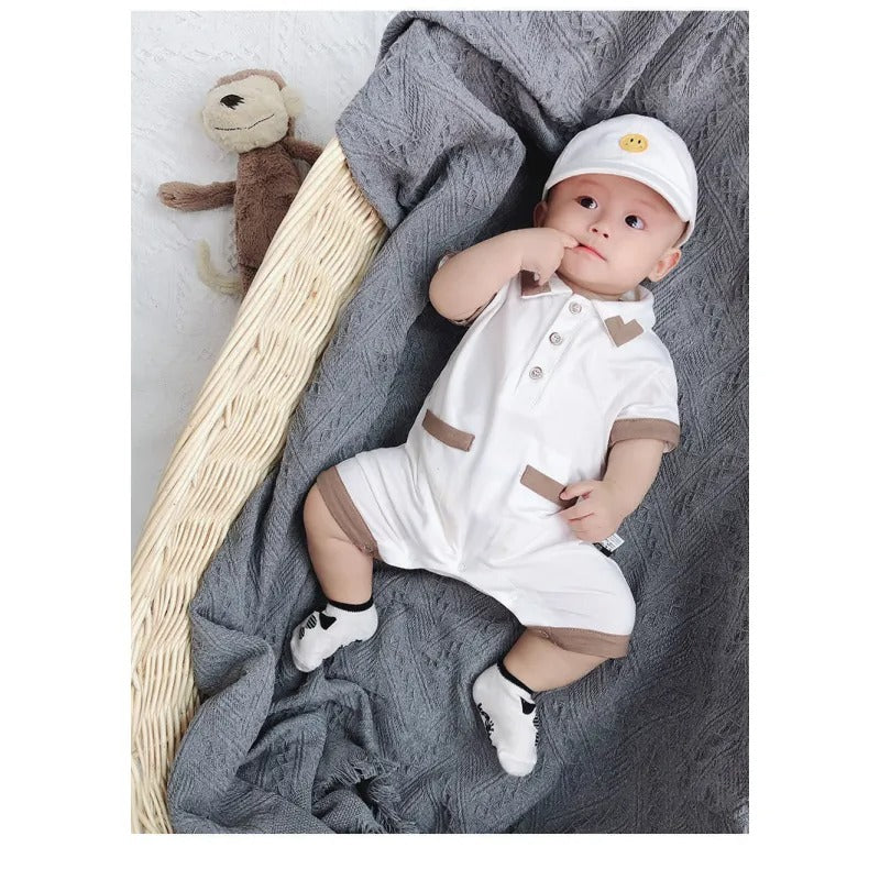 Charming baby boy wearing a White Collared romper, ideal for formal and casual wear from Ju Ju Jam.