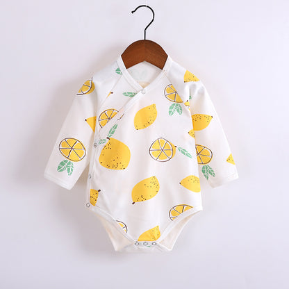 Baby boy and girl in a Yellow Lemon romper from Ju Ju Jam.