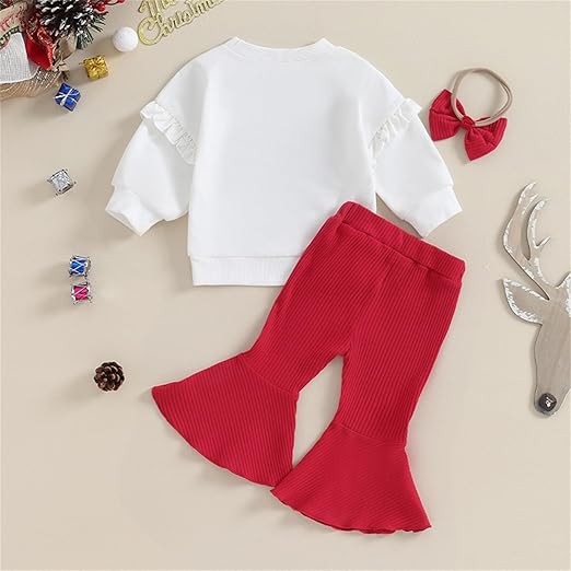 Baby girl laughing while wearing the Merry Christmas Top with Bell Bottom Set, spreading holiday cheer.