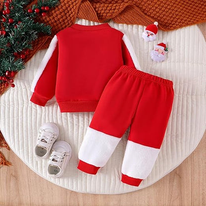 Festive Christmas Santa Baby Boys Co-ords Set photographed with holiday decorations, ideal for Christmas photos.