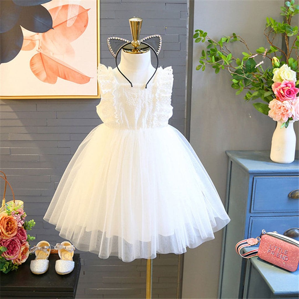 White Frill Girls Princess Dress by Ju Ju Jam, featuring delicate frills for a graceful and elegant look.